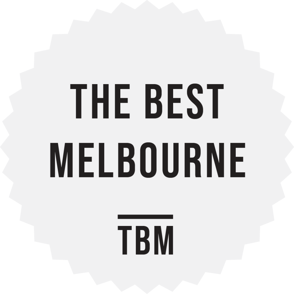 A badge design with the text 'THE BEST MELBOURNE' and 'TBM' displayed prominently, featuring a circular starburst shape.
